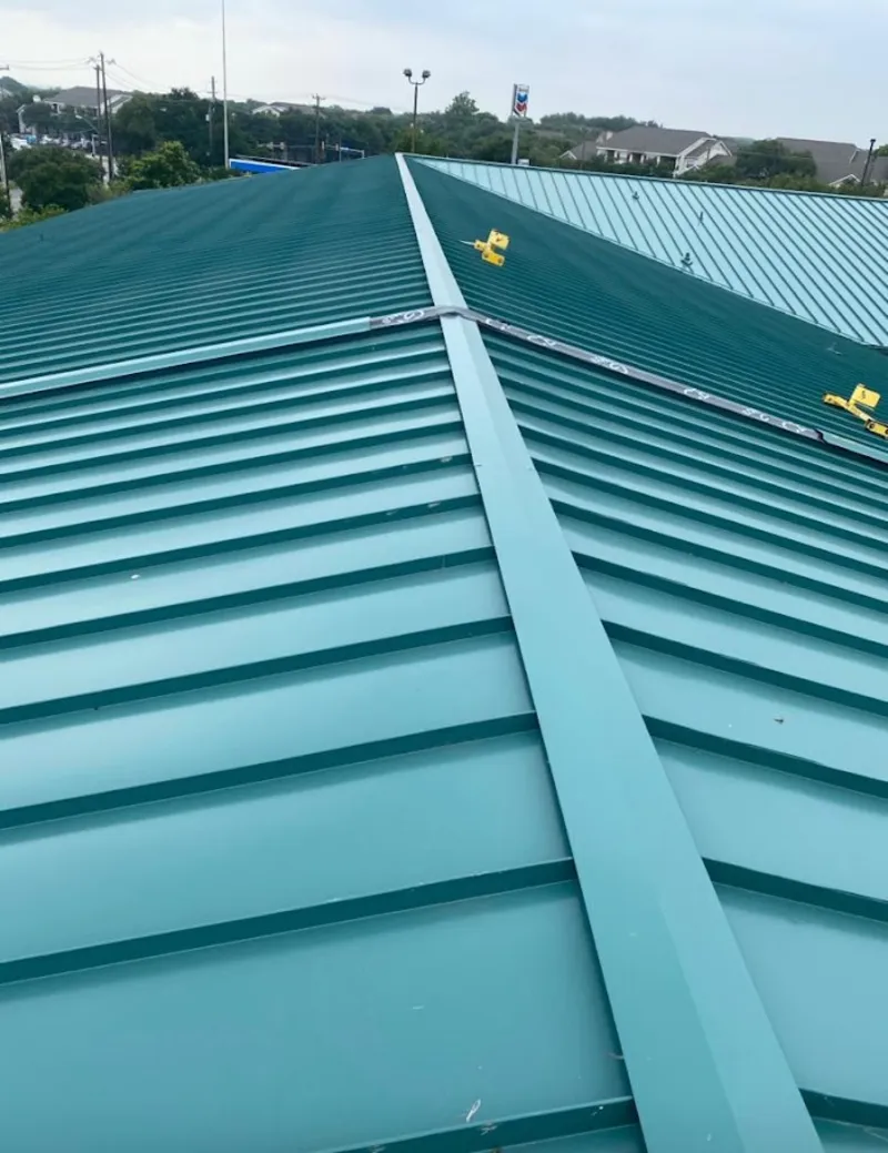 Green commercial metal roof ridge and valley for Metal Roof Repair in Hurst